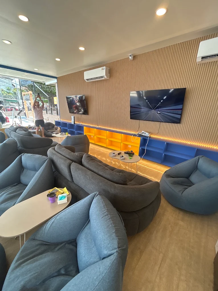 Snoop Weed lounge interior with bean bags and screens